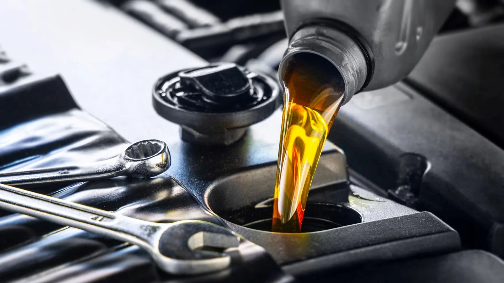 gettyimages adding engine oil